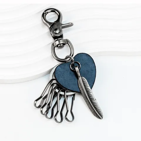 Llavero de Cuero y Aleación de Zinc Vintage Colgante Creativo de Pluma y Corazón Anello Llavero Cuerda Trenzada A Mano Amuleto de Bolsa Regalo Para Casual Diario Souvenir de Viaje Accesorios Unisex