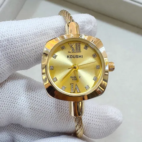 Orologio da Donna a Bracciale in Filo di Lega di Moda Elegante con Accenti di Strass Quadrante Tondo Orologio al Quarzo Gioielli Decorativi