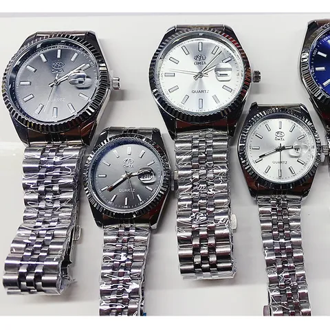 Reloj de Cuarzo Impermeable de Aleación y Acero Inoxidable Business Esfera Redonda Calendario Correa de Metal de Lujo para Parejas Hombres Mujeres