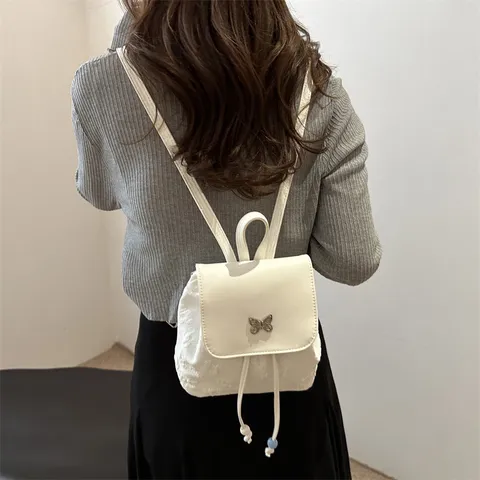 Femmes Mode Décontracté Sac à Dos Petit Voyage Rucksack Mignon Nœud Décor Métal Cuir PU Résistant à l'Eau Sac Quotidien