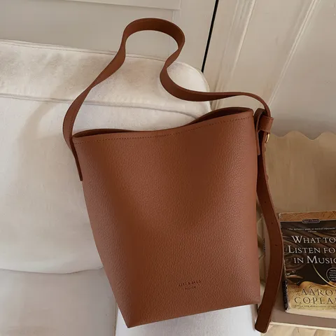 Retro Large Capacity PU Leather Bucket Bag For Women Fashion Commuting Solid Color Tote Bag Shoulder Bag With Charm