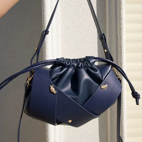 Damen Retro PU Leder Beuteltasche Umhängetasche Weich Leder Plissiert Kordelzug Nischen Design Handtasche