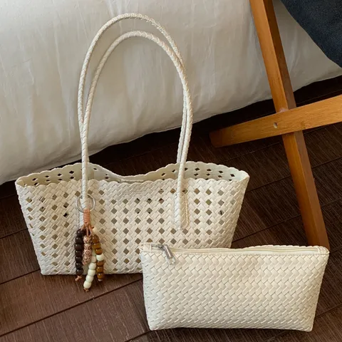 Women Large Capacity Tote Bag PU Leather Woven Hollow Out Shoulder Bag Casual Commuter Underarm Bag With Pendant