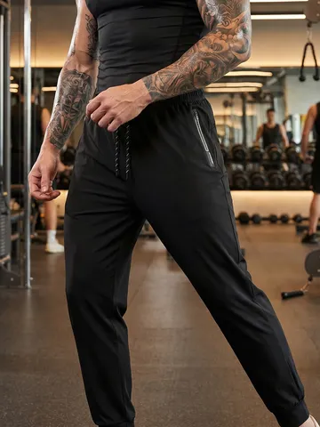 Herren Europäische Größe Schnelltrocknende Jogginghose Elastische Taille Sporthose Mit Reißverschlusstaschen Einfarbig Sportboden