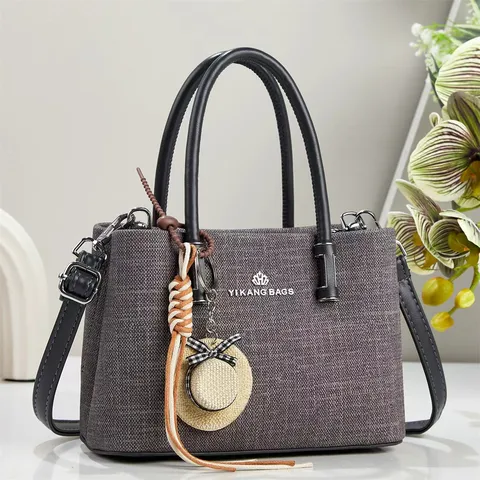 Dames Effen Kleur PU Leer Schoudertas Koreaanse Stijl Handtas Met Strohoed Bedeltje Modieuze Crossbody Tas