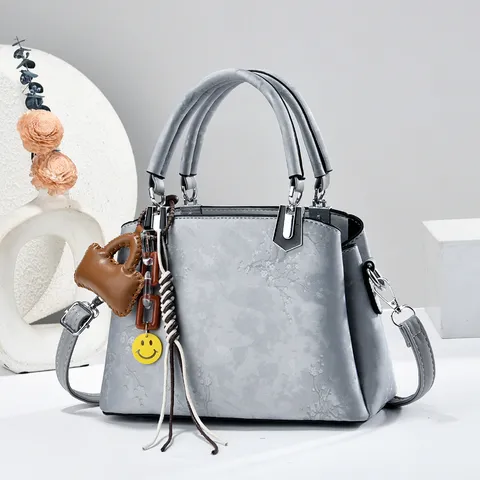 Damen Mode PU Leder Handtasche Lässige Pendler Umhängetasche Mit Stilvoller Anhänger Dekoration Für Den Täglichen Gebrauch