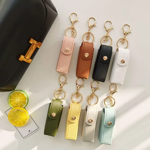 Porte-clés Étui Porte-Rouge à Lèvres en Cuir PU Mini Pochette De Rangement Portable De Rouge à Lèvres Avec Anneau En Métal Pendentif De Sac De Voiture Cadeau Pour Femmes