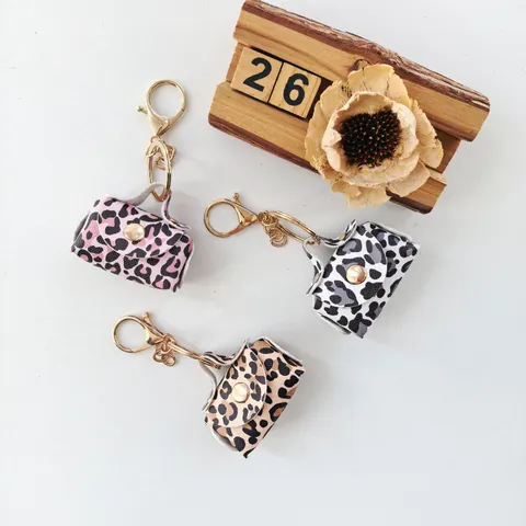 Porte-clés Mini Sac Imprimé Léopard Style Rétro Porte-monnaie Portable Sac de Rangement pour Rouge à Lèvres Pendentif Charme de Sac pour Femme