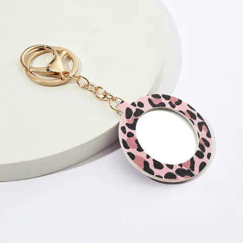 Porte-Clés Miroir de Poche Rond en Cuir PU Imprimé Léopard Joli Charme de Sac Miroir de Maquillage Portable Cadeau Anneau de Clés