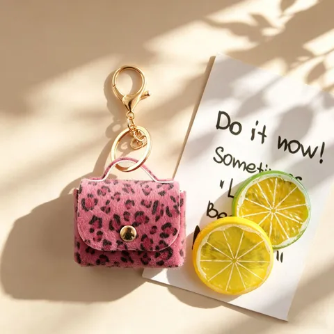 Porte-Clés en Pluche à Imprimé Léopard Mini Porte-Monnaie Sac de Rangement pour Écouteurs Pendentif de Sac Moelleux Mignon Cadeau Anneau de Clés