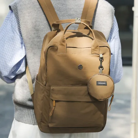 Waterproof Nylon Student Backpack in Solid Color With Spacious Compartment And Matching Coin Purse Ideal For Daily Travel And Commuting