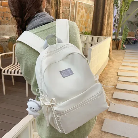 Large Capacity Minimalist Nylon School Backpack For Students Casual Bookbag Travel Daypack With Cute Pendant
