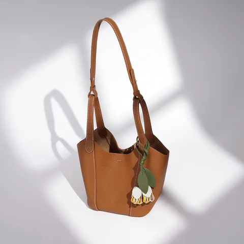 Sac Seau en Cuir Véritable pour Femmes Mode Commuter Sac à Main Classique Couleur Unie Cabas avec Pendentif Floral