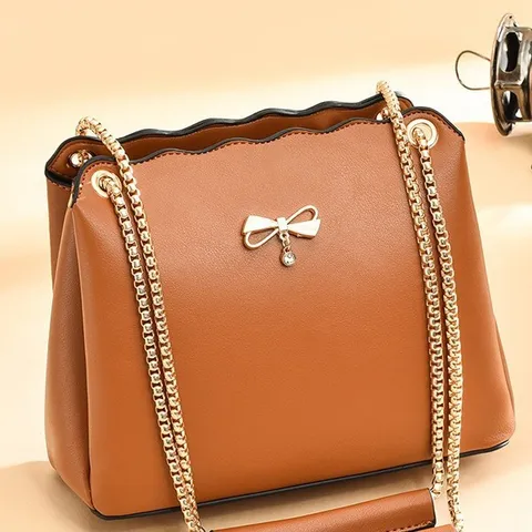 Borsa Secchiello in Pelle PU Moda Donna Elegante Casual Borsa a Tracolla Con Fiocco Catena Quotidiana