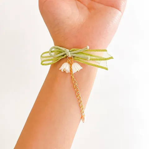 Cravatta Per Capelli Con Fiocco E Nappa Giglio Della Valle Verde Accessorio Elegante Donna