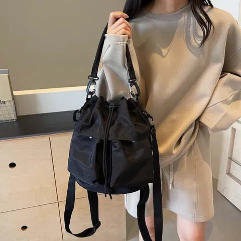 Koreanischer Stil Wasserdichtes Oxford-Gewebe Eimer Tasche Große Kapazität Damen Schulter Umhängetasche Kordelzug Rucksack