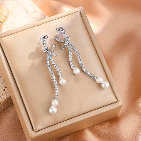 Elegante Lange Strik Oorknopjes voor Dames Luxe Gedraaide Strass Kunstparel Hanger Oorbellen Bruiloft Sieraden
