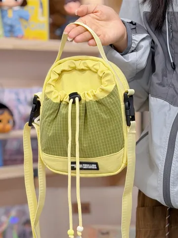 Women Casual Nylon Plaid Bucket Bag Cute Drawstring Crossbody Bag Small Shoulder Bag With Optional Plush Pendant
