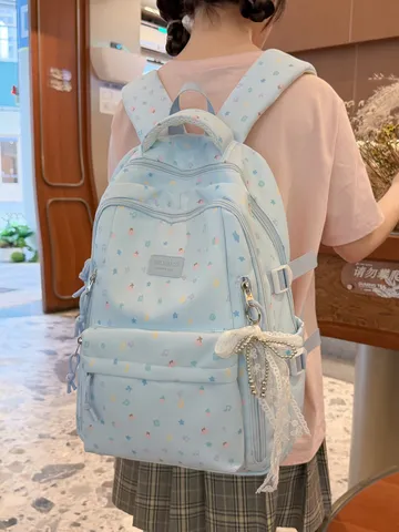 Style Japonais Mignon Imprimé Étoile Sac à Dos Décontracté Fille Douce Voyage Léger Sac d'École avec Pendentif Nœud