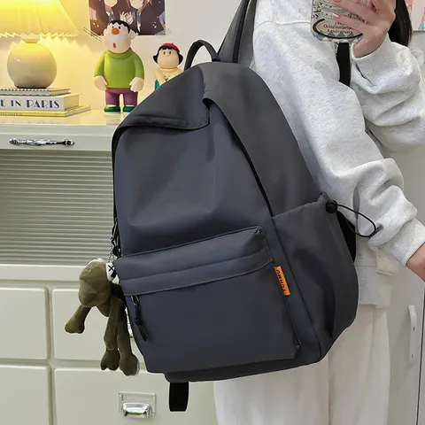 Minimalist Large Capacity Solid Color Nylon Backpack Casual School Bookbag Waterproof Travel Daypack For Men And Women