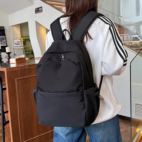 Casual Nylon Backpack Large Capacity School Bag Travel Daypack With Cute Pendant Waterproof Bookbag For Women And Men