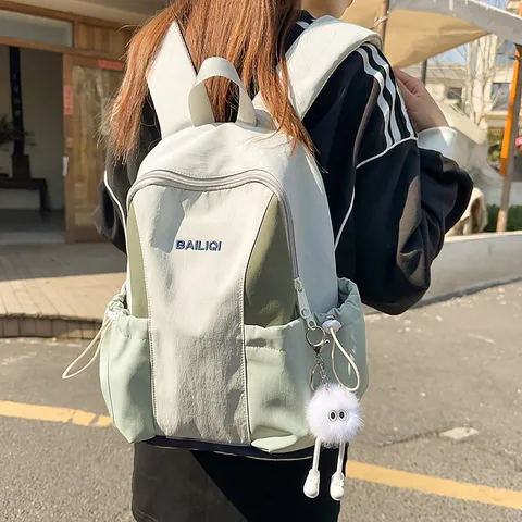 Waterproof Nylon Casual Backpack Large Capacity School Bag For Women Travel Daily Daypack With Cute Plush Pendant