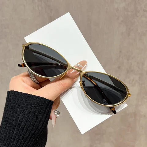 Occhiali da Sole Cat Eye in Acciaio Inossidabile Retro per Donna Uomo Moda Protezione UV400 Montatura in Metallo
