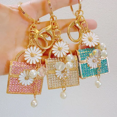 Cute Metal Rhinestone Daisy Handbag Keychain Artificial Pearl Tassel Mini Bag Pendant Creative Zinc Alloy Flower Bag Charm Jewelry Gift For Women