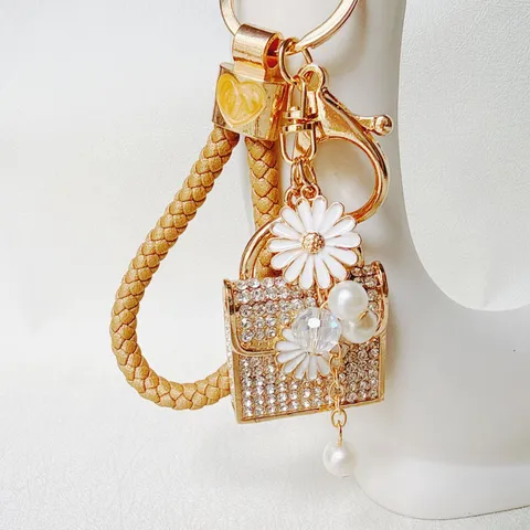 Cute Metal Rhinestone Daisy Handbag Keychain Artificial Pearl Tassel Mini Bag Pendant Creative Zinc Alloy Flower Bag Charm Jewelry Gift For Women