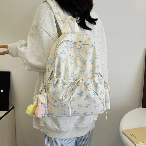 Mochila de Nailon Estilo Ins Coreano para Mujer Gran Capacidad Bolso Escolar Con Bonito Estampado de Lazo y Colgante