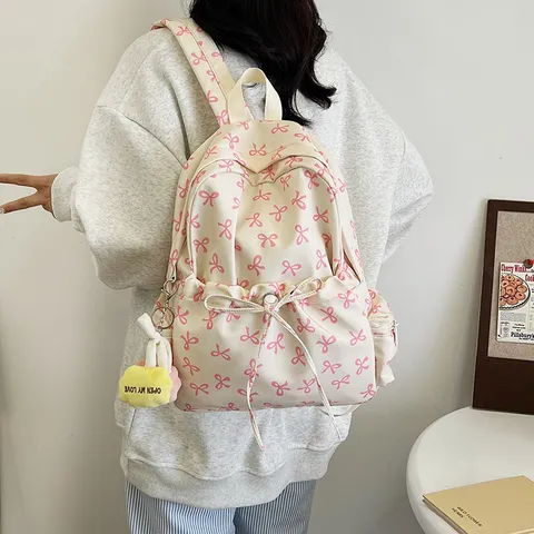 Mochila de Nailon Estilo Ins Coreano para Mujer Gran Capacidad Bolso Escolar Con Bonito Estampado de Lazo y Colgante