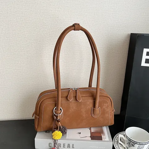Nische Französisch Retro PU Leder Underarm Tasche Damen Schick Vielseitig Handtasche Umhängetasche Mit Anhänger