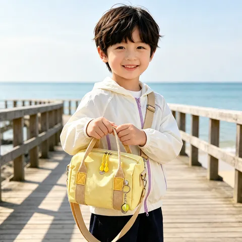 Koreanischer Stil Kinder Tragbare Kleine Handtasche Oxford-Gewebe Reisetasche Kontrast-Gurtband Sportliche Reisetasche Mit Tennisracket-Anhänger