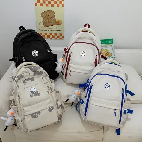Koreaanse Stijl Grote Capaciteit Nylon Rugzak College Student Schooltas Casual Reizen Daypack Met Schattige Hanger