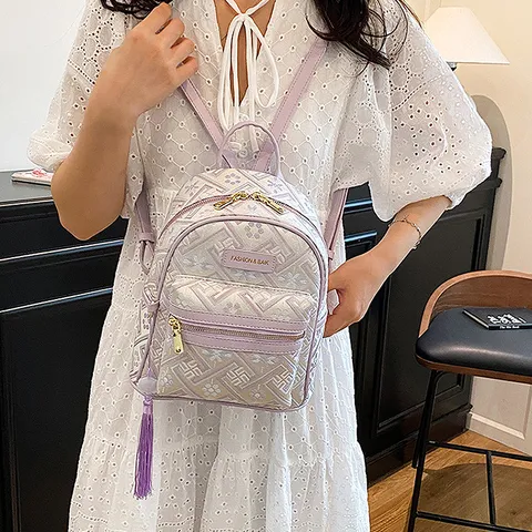 Women Mini Backpack Embossed Nylon Casual Travel School Bag With Tassel Cute Daypack Fashion Designer Handbag
