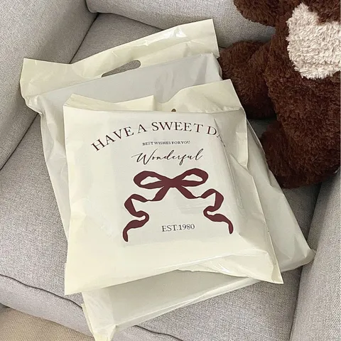 Ins Bow Print Waterproof Plastic Packaging Bag Transparent Frosted Express Packing Bag Clothing Storage