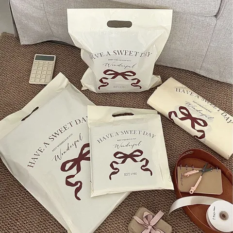 Ins Bow Print Waterproof Plastic Packaging Bag Transparent Frosted Express Packing Bag Clothing Storage