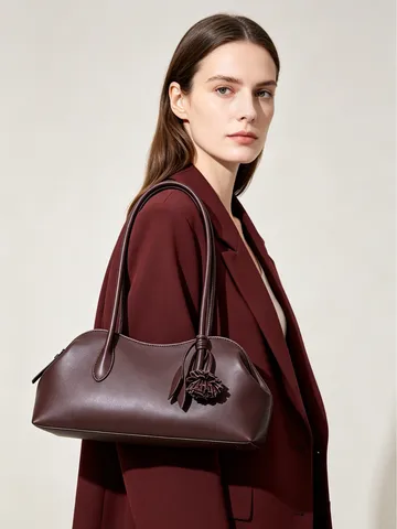 Bolso de Concha de Cuero de Vaca Minimalista para Mujer Bolso de Mano de Lujo de Nicho Bolso de Hombro de Moda con Borla