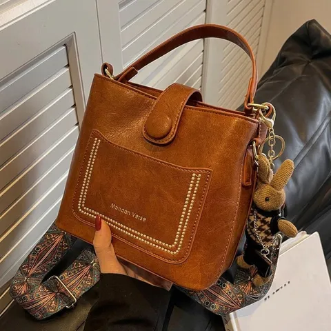 Retro PU Leather Bucket Bag For Women With Rabbit Charm And Ethnic Patterned Wide Strap Small Versatile Crossbody Handbag