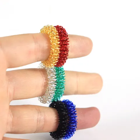 Mini Anillo de Masaje de Dedo de Metal Resorte Descompresión Fidget Toy Herramienta de Alivio del Estrés Portátil
