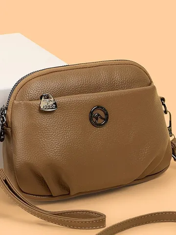 Damen Weiches PU Leder Kleine Umhängetasche Einfach Pendeln Schulter Handytasche Mit Metall Känguru Logo Dekor