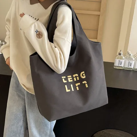 Große Kapazität Buchstaben Bestickte Segeltuch Tragetasche Damen Casual Pendeln Schultertasche Hochwertige Stoff Handtasche