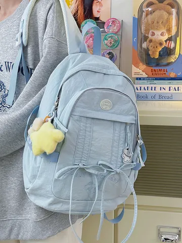 Women Casual Large Capacity Nylon Backpack Solid Color Travel Commuter School Bag With Laptop Compartment And Cute Pendant