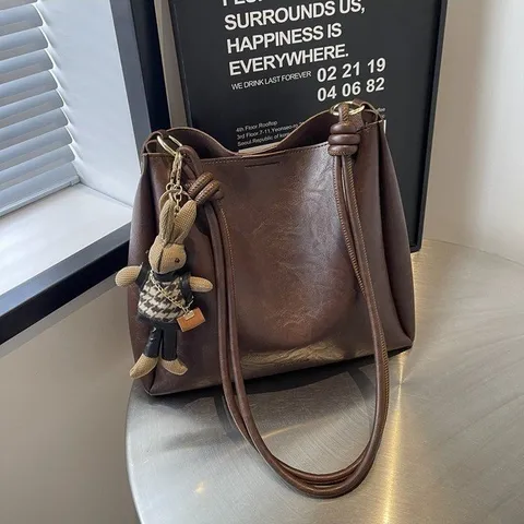 Women Fashion Large Capacity PU Leather Bucket Bag Casual Commuter Shoulder Crossbody Bag with Cute Rabbit Charm