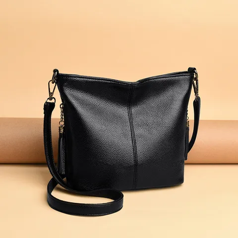 Dames Casual Grote Capaciteit PU Leer Emmer Tas Vintage Effen Kleur Kwastje Schouder Crossbody Tas Dagelijkse Handtas