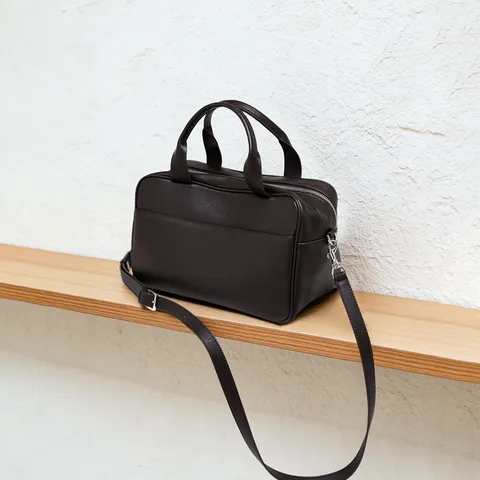 Große Kapazität Boston Bag Damen Pendler Französisches Nischendesign Griff Umhängetasche Schultertasche Leder Bowling Bag