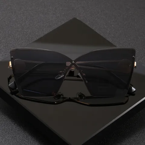 Lunettes de Soleil Yeux de Chat Mode Unisexe Protection UV400 Sans Monture Cadre en Acier Inoxydable Voyage Fête