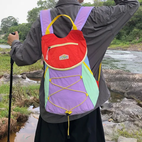 Mochila de Senderismo de Nailon con Bloques de Color de Dopamina Gran Capacidad Bolsa de Viaje Impermeable Fitness al Aire Libre Ciclismo Mochila Casual para Mujer Hombre