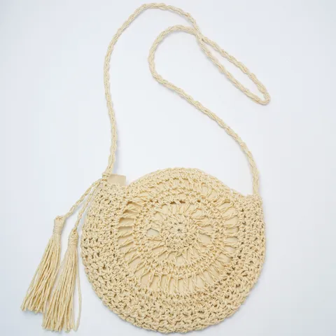 Women's Straw Woven Shoulder Bag Casual Beach Vacation Round Crossbody Bag Handcrafted Tassel Hollow Out Handbag