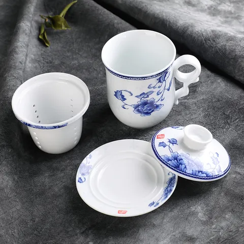 Dehua Ceramic Office Four Piece Tea Mug Set With Lid Infuser And Saucer Filter Home Tea Cup Gift Box
